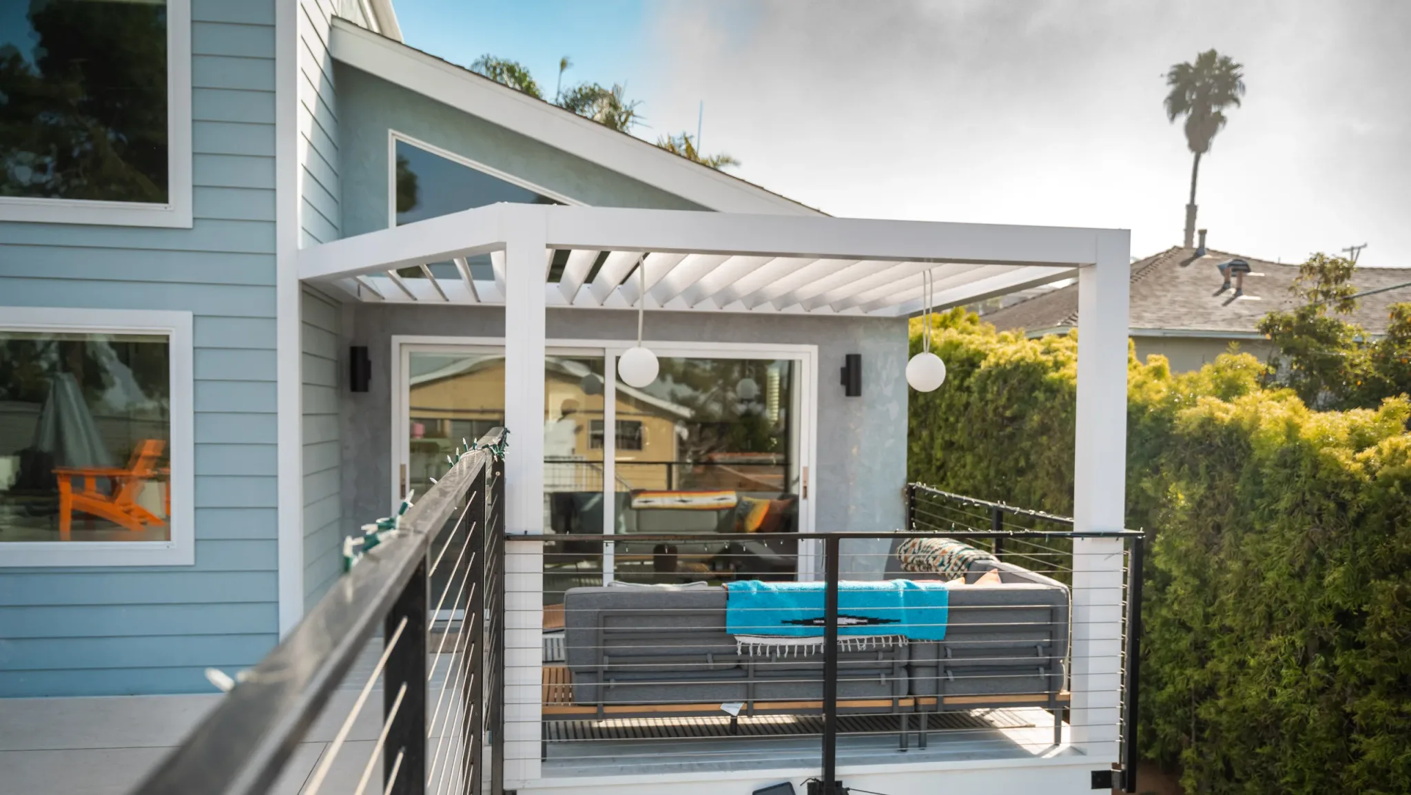 R-BREEZE fixed louvered pergola installed on a residential deck